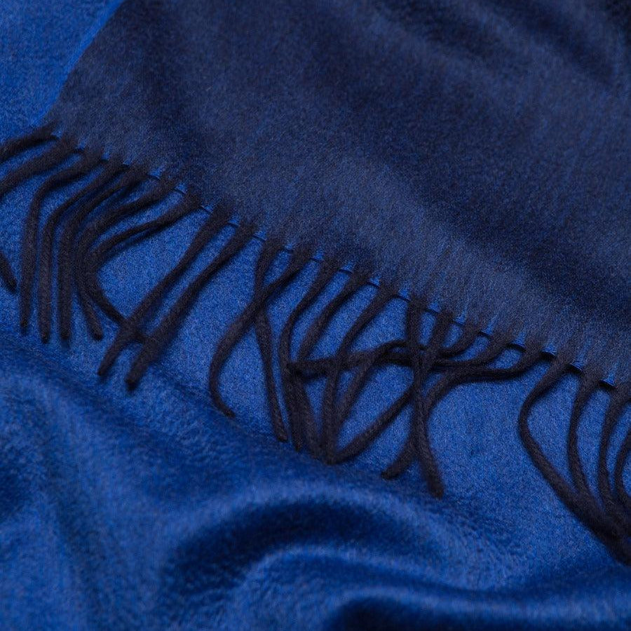 Close-up of a blue fabric with fringes